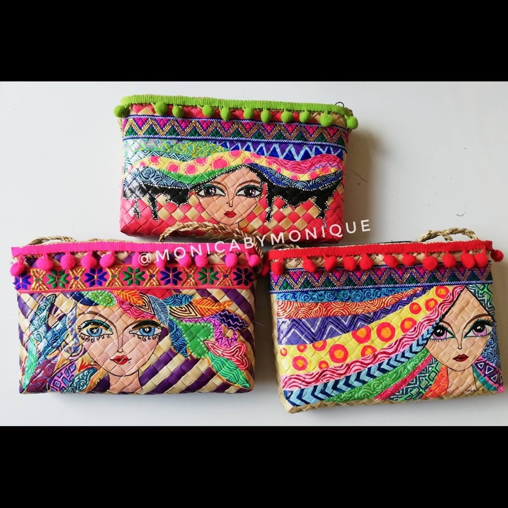 Hand painted sling bags.
